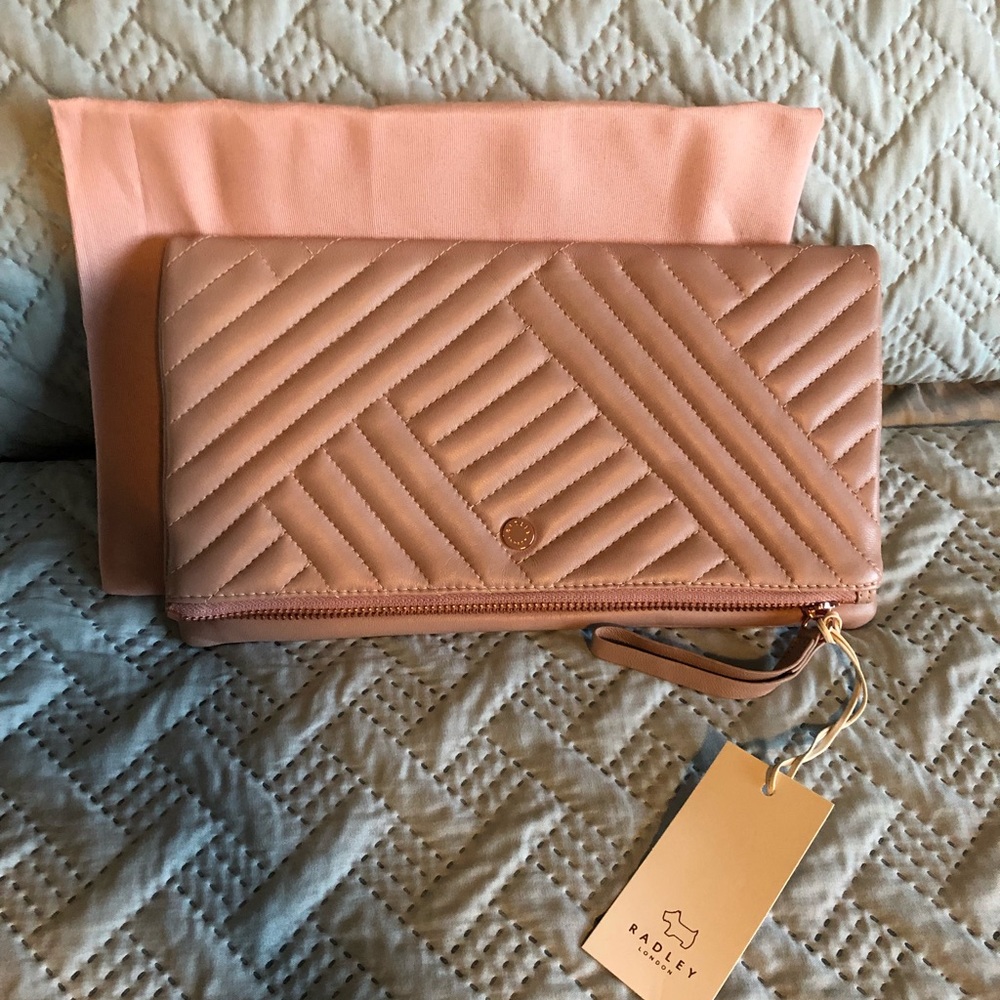 Radley London leather wristlet in old rose color.